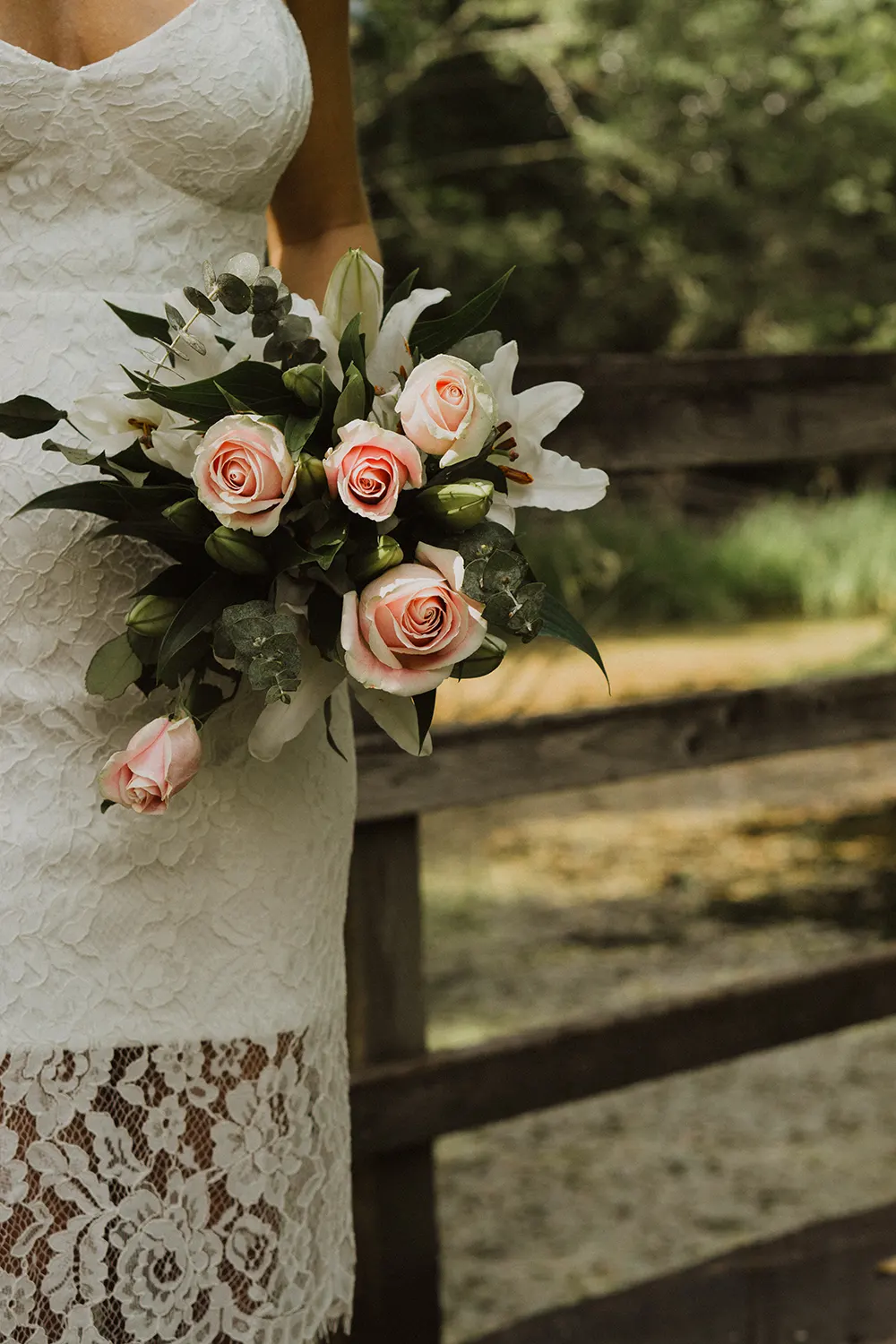 bride holding flower bouquet